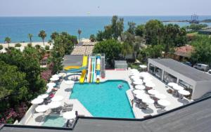 an overhead view of a pool with a water slide at SEAPHORIA BEACH HOTEL & Spa - by Mir'Amor-Ultra All Inclusive in Antalya