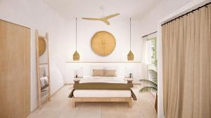 a bedroom with a bed and a large window at Apartamentos Punta Rasa in Cala Saona