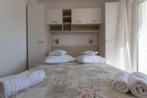 Postel nebo postele na pokoji v ubytování Apartments Senka