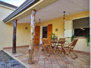 Φωτογραφία από το άλμπουμ του La Parapepita - Villetta con giardino privato σε Orosei