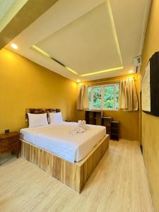 Voodi või voodid majutusasutuse BAMBOO OASIS toas