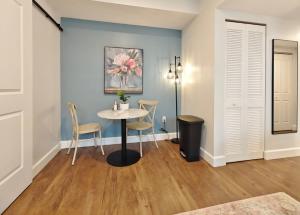a dining room with a table and chairs at Fun Cozy Apts - 1 25 Mile Walk to TIAA Bnk Fld in Jacksonville