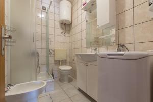 Koupelna v ubytování Apartments Senka + 35 fotografií