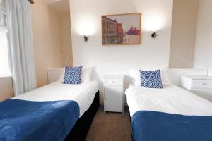 Katil atau katil-katil dalam bilik di Killarney View House B&B