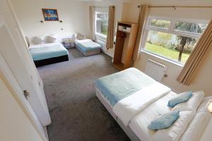 Katil atau katil-katil dalam bilik di Killarney View House B&B