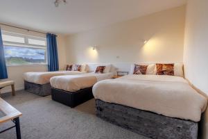 Katil atau katil-katil dalam bilik di Killarney View House B&B