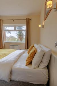 Katil atau katil-katil dalam bilik di Killarney View House B&B