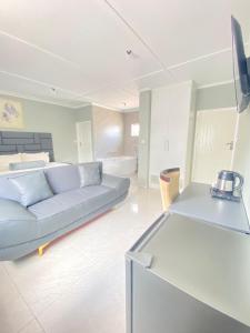 TV a/nebo společenská místnost v ubytování Cumberland Guest Lodge