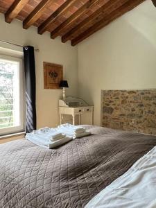 Posteľ alebo postele v izbe v ubytovaní Villino Mami con piscina e vista mare panoramica