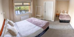 Katil atau katil-katil dalam bilik di Killarney View House B&B
