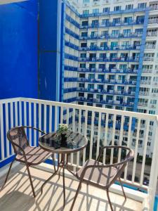 Un balcon sau o terasă la Minimalist Condotel at SMDC Sea Residences