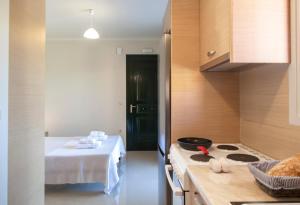 Postel nebo postele na pokoji v ubytování Voula Villa Agios Ioannis 2