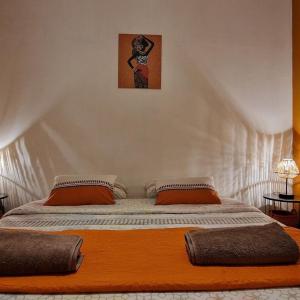 Llit o llits en una habitació de La villa Les Terrasses sur le Port, 6 personnes avec jaccuzi Les visites ne sont pas autorisées