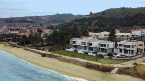 an aerial view of a house on the beach at Villa Adele in Polychrono