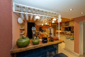 a store with a counter with green water melons on it at Raymond Blue Hotel in Istanbul