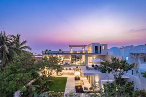 an aerial view of a house with a sunset at 3021 - La Montosa in Santa Cruz Huatulco