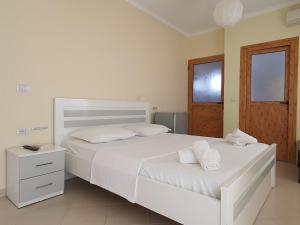 Postel nebo postele na pokoji v ubytování Mintt Hotel