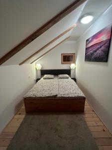 Кровать или кровати в номере DRiM Wood House