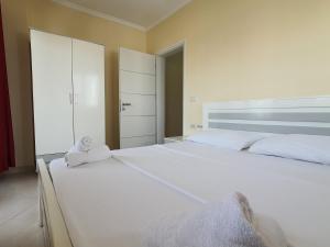 Postel nebo postele na pokoji v ubytování Mintt Hotel