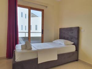 Postel nebo postele na pokoji v ubytování Mintt Hotel