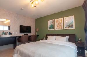 Ένα ή περισσότερα κρεβάτια σε δωμάτιο στο Rusutsu Grand Cabin - Vacation STAY 16626v