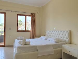 Postel nebo postele na pokoji v ubytování Mintt Hotel