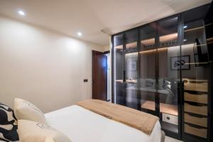 Łóżko lub łóżka w pokoju w obiekcie PRB Aparment Puerto del Carmen