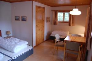 Un pat sau paturi într-o cameră la Kanalvillan