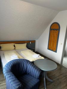 Un pat sau paturi într-o cameră la Apartment Nordland für 2 Personen 402, 408, 409 +2 fotografii