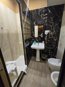 Koupelna v ubytování Hotel Iris