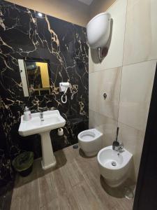 Koupelna v ubytování Hotel Iris