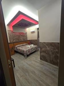 Postel nebo postele na pokoji v ubytování Hotel Iris