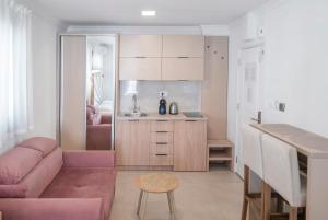 Kuchyň nebo kuchyňský kout v ubytování Apartments Mary
