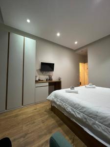 Postel nebo postele na pokoji v ubytování Urban Room 1