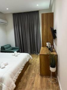Postel nebo postele na pokoji v ubytování Urban Room 1