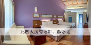 Voodi või voodid majutusasutuse Ding Jia Garden Resort toas
