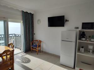 Kuchyňa alebo kuchynka v ubytovaní Apartamentos Caracas