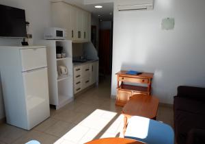 Kuchyňa alebo kuchynka v ubytovaní Apartamentos Caracas
