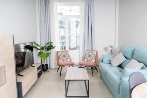 A seating area at Apartamentos Turísticos Plaza del Rey by CartagenaSpain