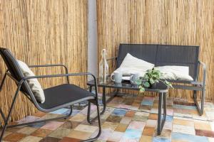 Khu vực ghế ngồi tại Appartement T3 climatisé centre ville Pérols +2 ảnh