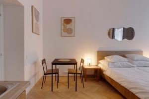 Posteľ alebo postele v izbe v ubytovaní Vita Nejedleho apartments