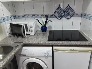 Kuchyň nebo kuchyňský kout v ubytování Residência Machado