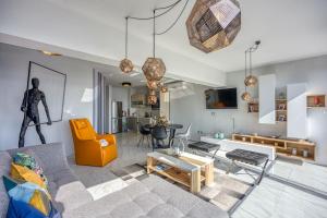 Ruang duduk di Luxury Apartment with Whirlpool