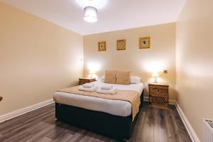 Postel nebo postele na pokoji v ubytování Finest Retreats - Netley Hall - Thyme
