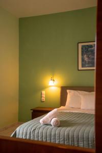 Ένα ή περισσότερα κρεβάτια σε δωμάτιο στο Chrisanthi Apartments