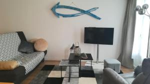 Fotografia z galérie ubytovania GuestReady - Apt rétro près de Grande Horloge v destinácii La Rochelle