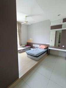 Llit o llits en una habitació de Melaka Private Castle
