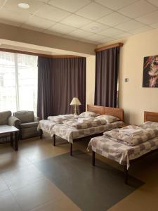 Letto o letti in una camera di DownTown B&B