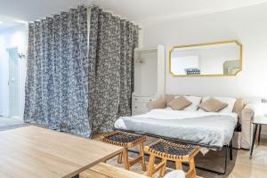 Gulta vai gultas numurā naktsmītnē So Stay - Appartement tendance avec 1 chambre à Montorgueil