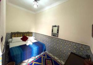 Voodi või voodid majutusasutuse Sun Hostel toas